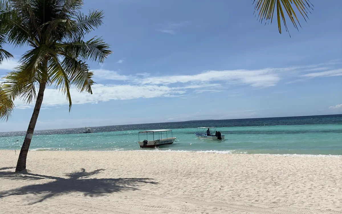 Glass-bottom boats waiting off a Panglao beach, Bohol